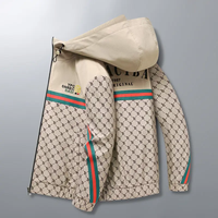 Elevate your streetwear game with this bold monogram print zip-up hoodie jacket